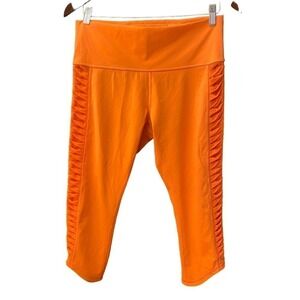 Lululemon sunshine salutation orange crop ankle legging ruffle hem size 10